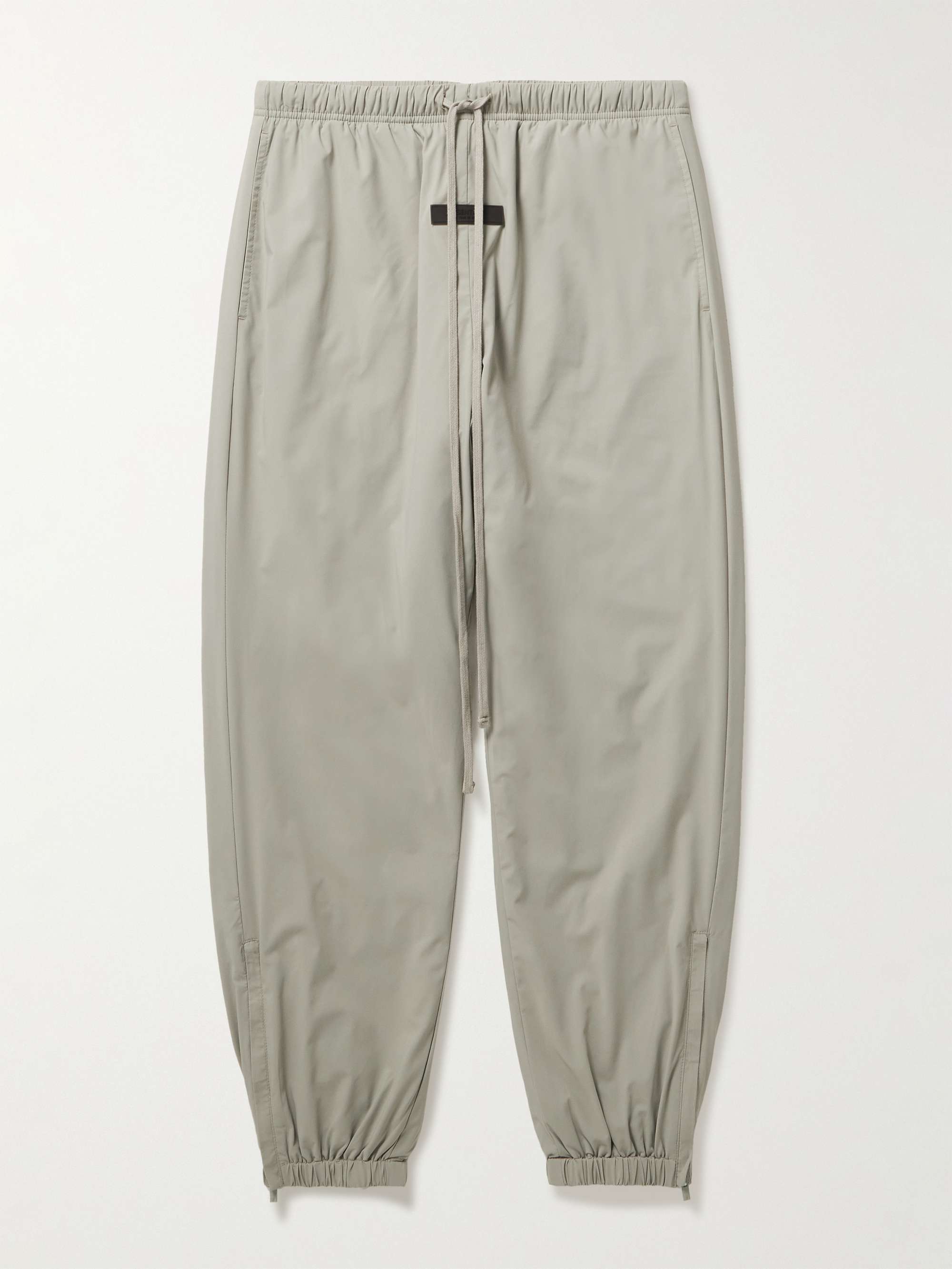 FEAR OF GOD ESSENTIALS Tapered Logo-Appliquéd Nylon-Blend Track Pants for  Men | MR PORTER