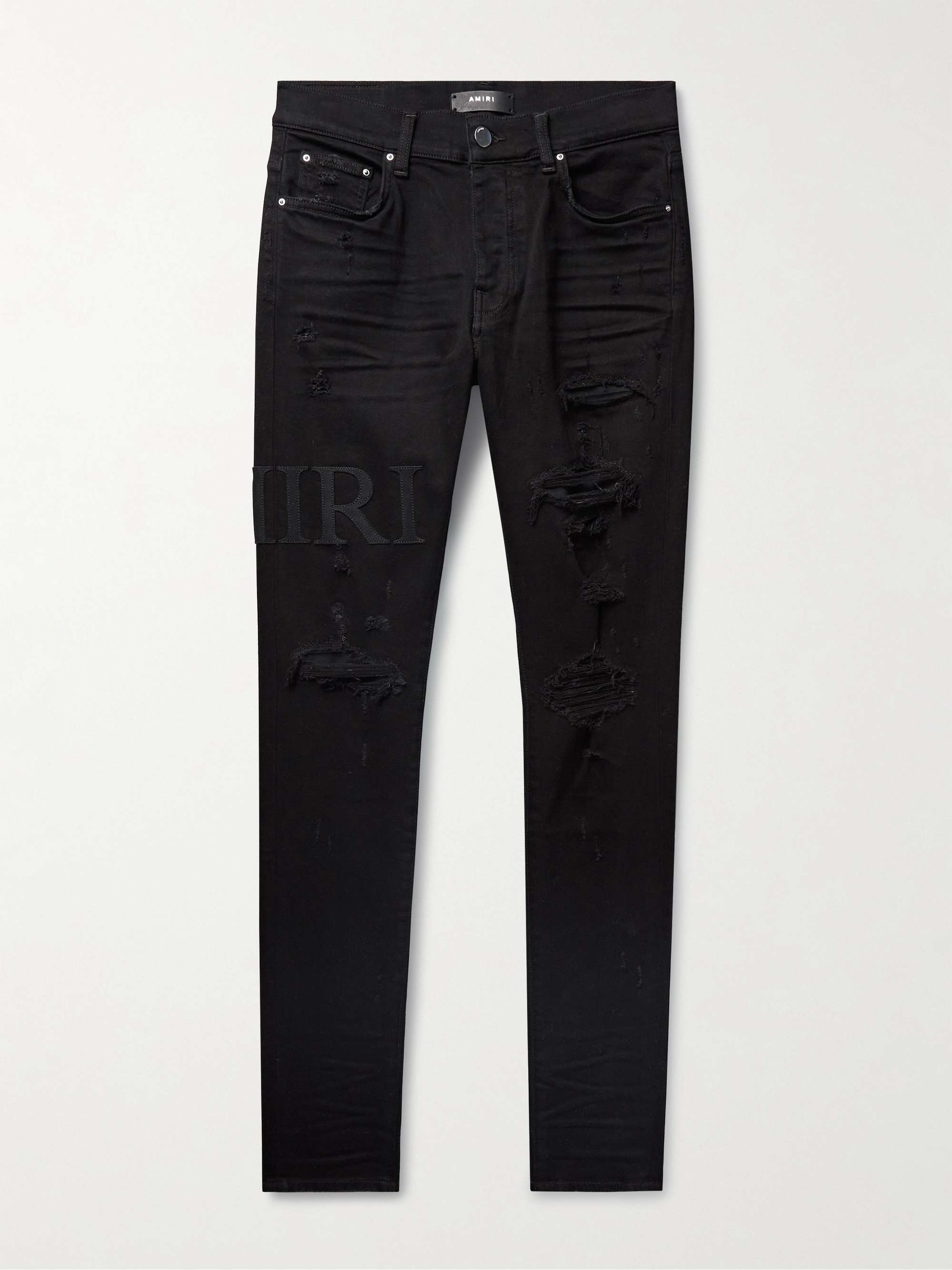 AMIRI Skinny-Fit Logo-Appliquéd Distressed Jeans | MR PORTER