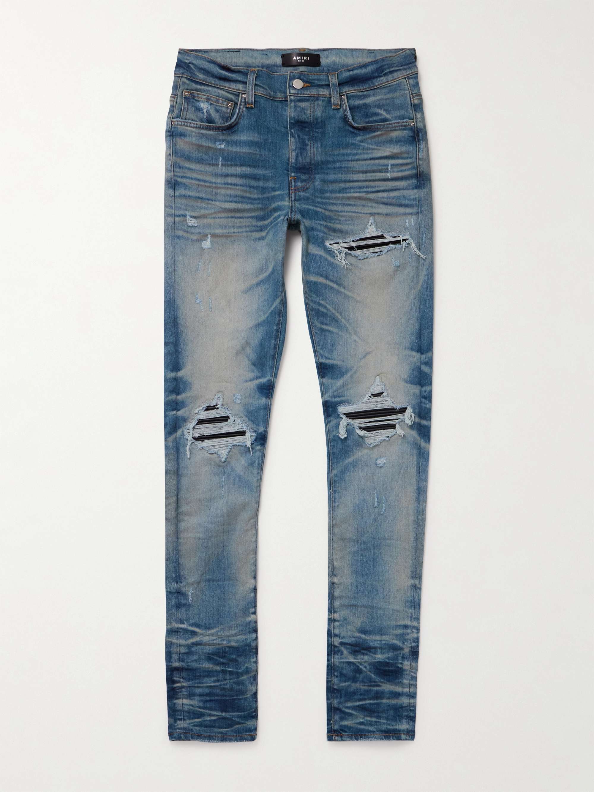 Jeans skinny effetto invecchiato con inserti in Ultrasuede® MX1 AMIRI da  uomo | MR PORTER