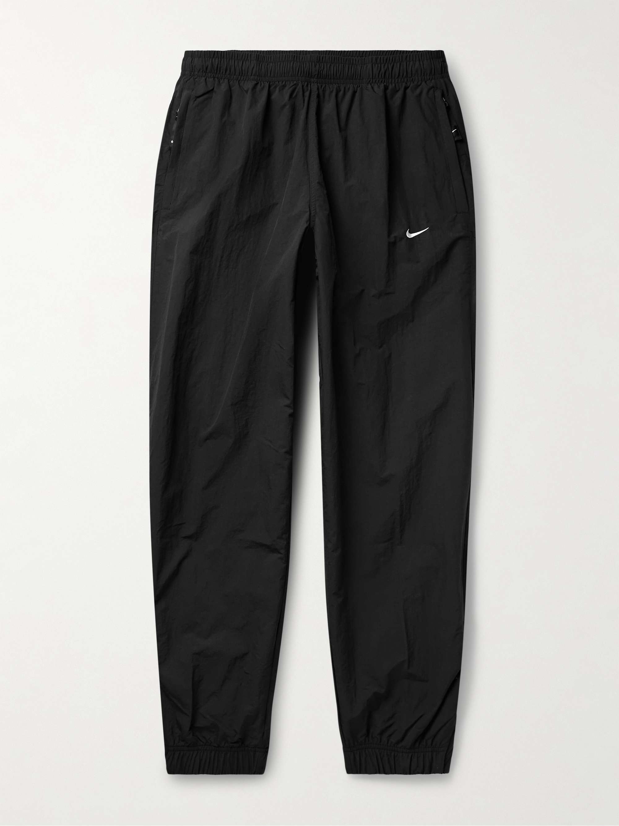 NIKE Solo Swish Tapered Logo-Embroidered Shell Track Pants for Men | MR  PORTER