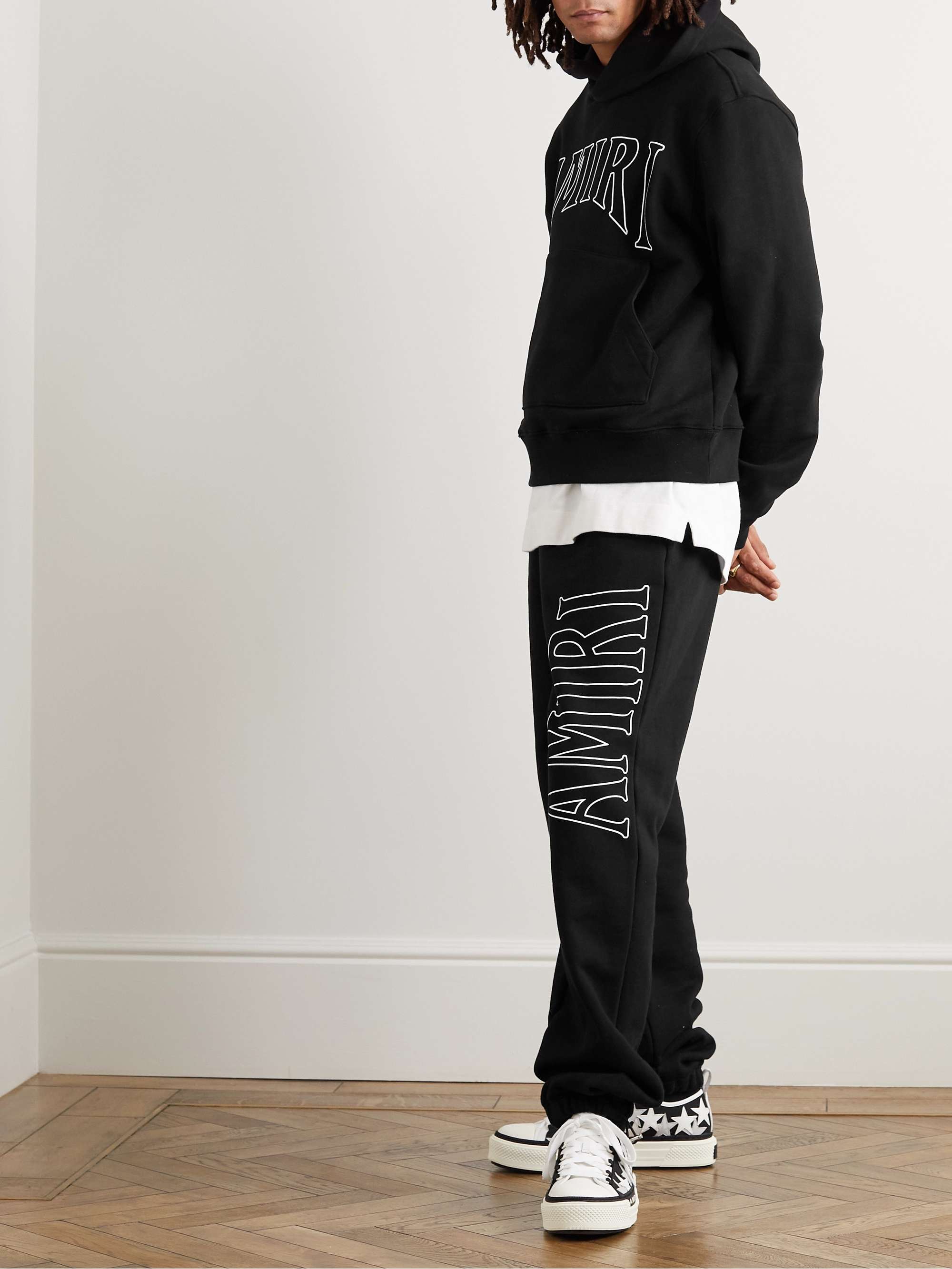 Pantaloni sportivi a gamba affusolata in jersey di cotone con logo stampato  Zoltar AMIRI da uomo | MR PORTER