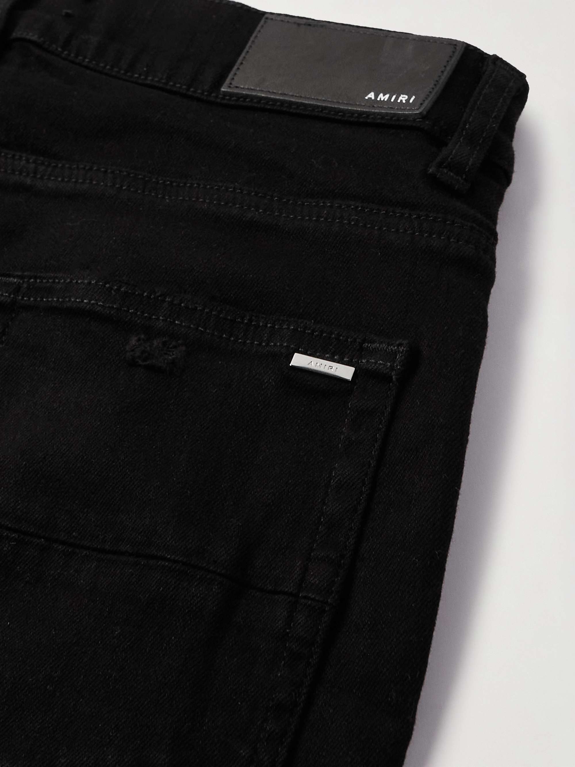 AMIRI MX1 Skinny-Fit Leather-Panelled Distressed Jeans for Men | MR PORTER