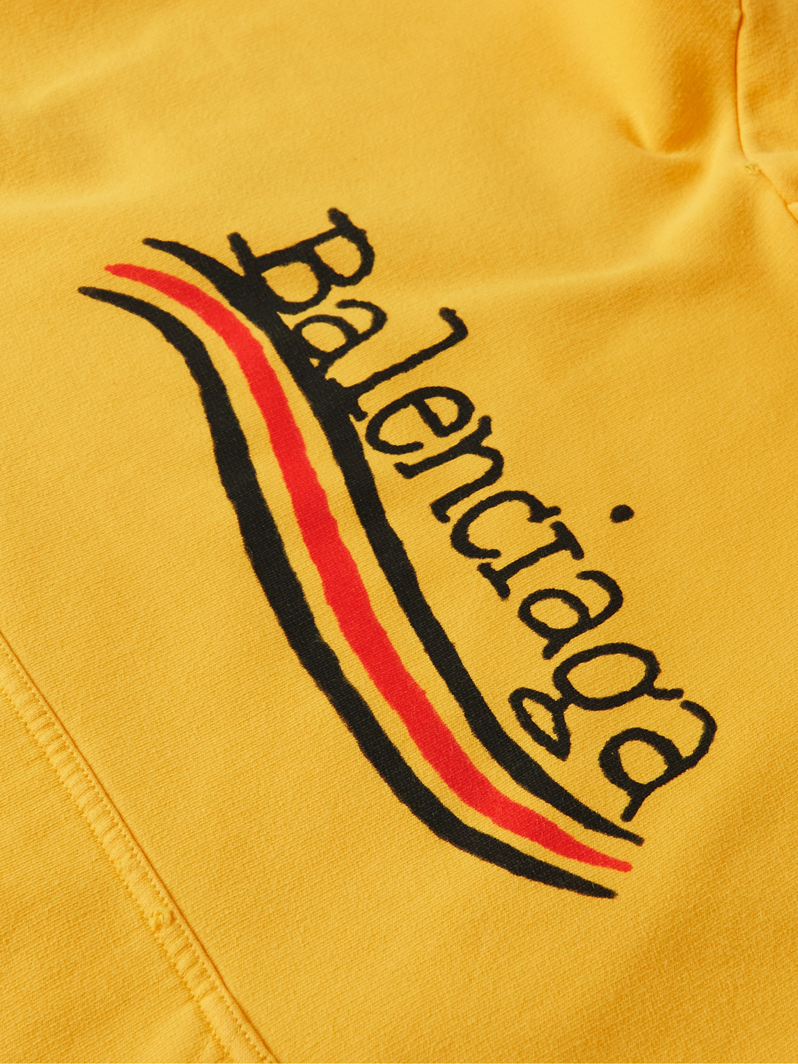 Balenciaga Distressed Logo-print Cotton-jersey Hoodie In Yellow