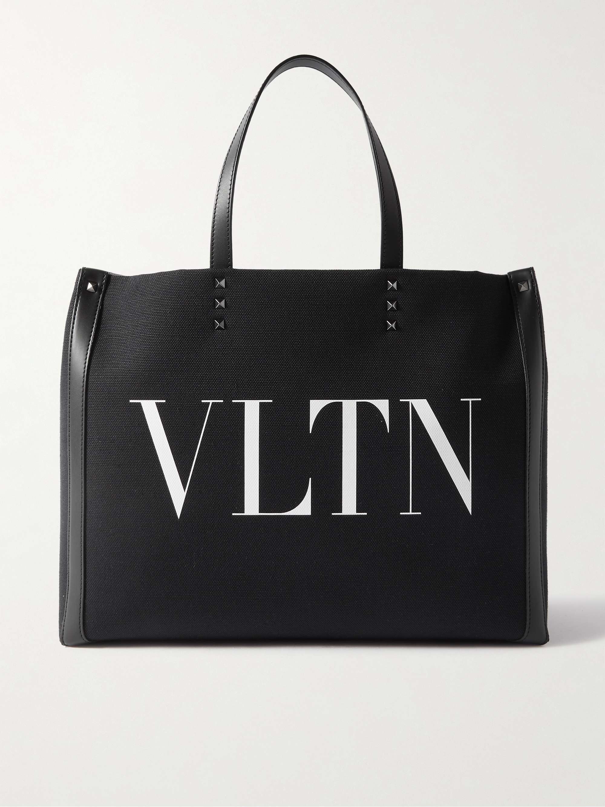 VALENTINO GARAVANI Medium Studded Leather-Trimmed Logo-Print Canvas Tote Bag  for Men | MR PORTER