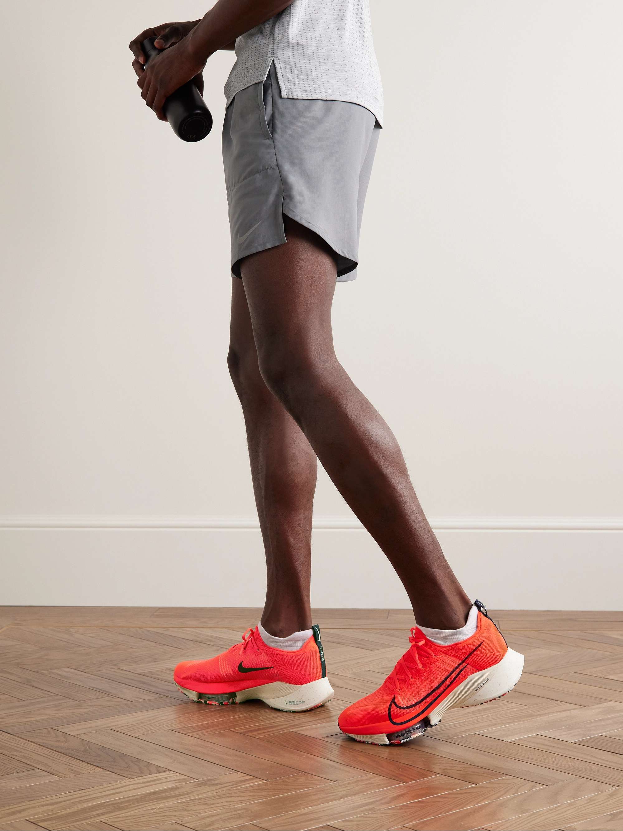 NIKE RUNNING Air Zoom Tempo Next% Flyknit Sneakers for Men | MR PORTER