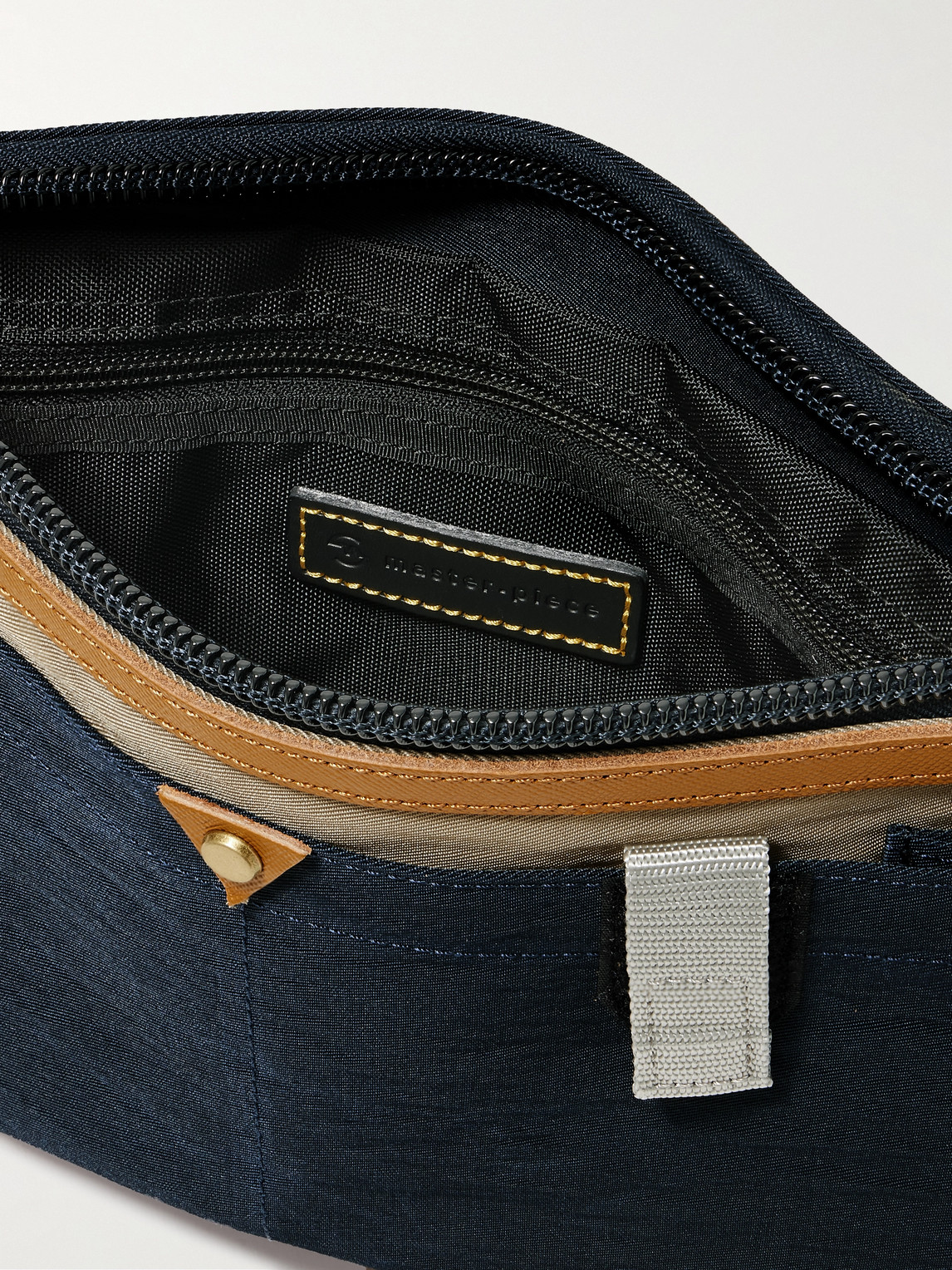 Shop Master-piece Link Leather-trimmed Colour-block Twill Messenger Bag In Blue