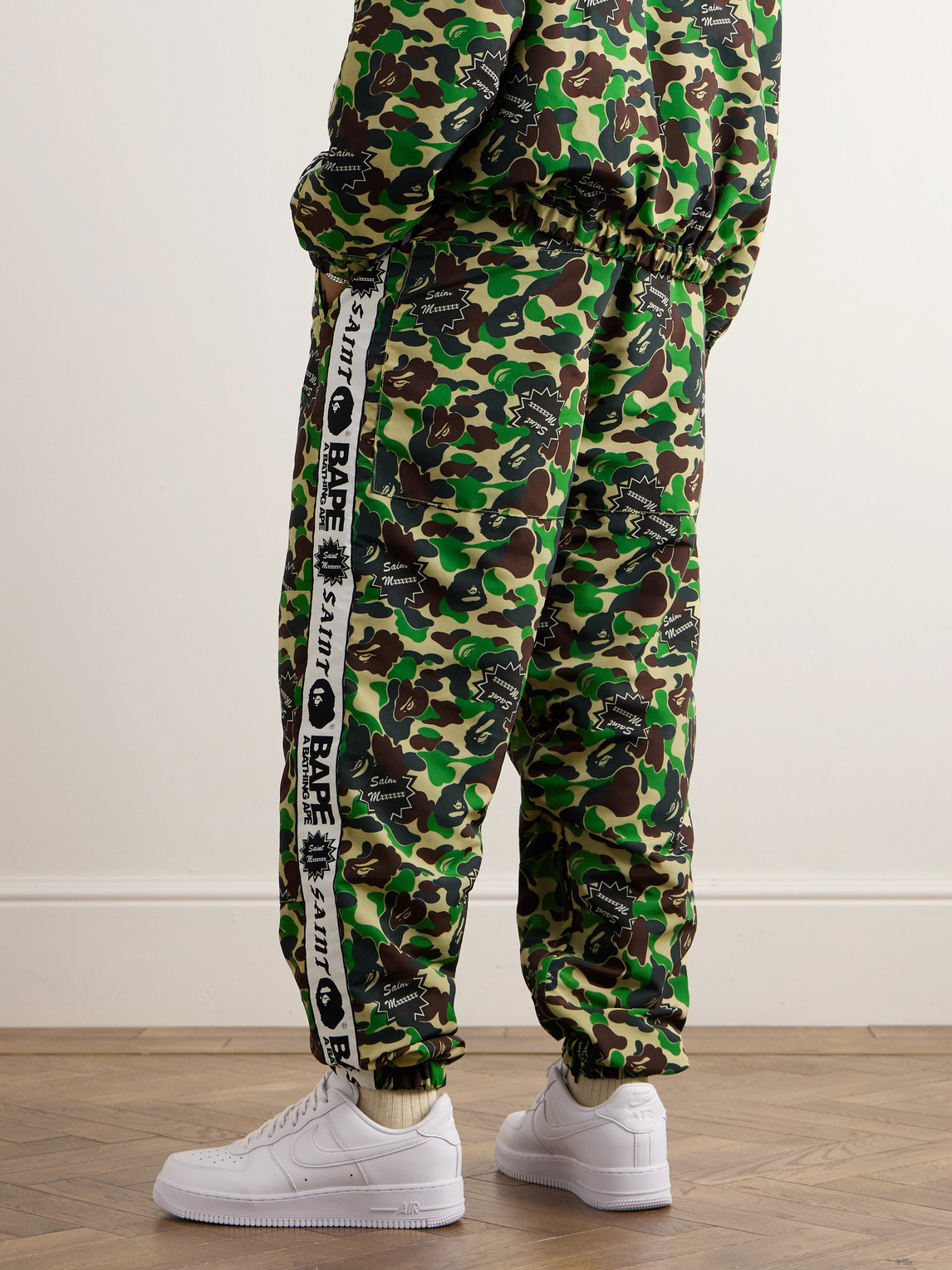 Shop Saint Mxxxxxx Bape® Straight-leg Webbing-trimmed Camouflage-print Shell Trousers In Green