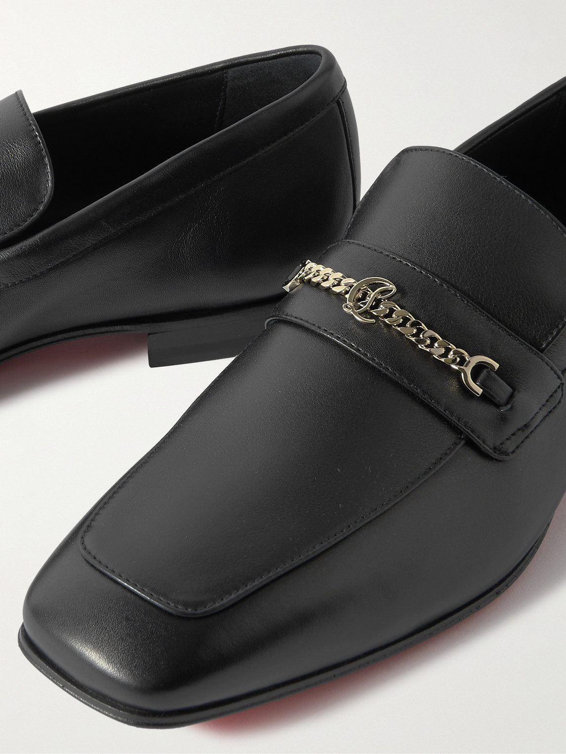 Shop Christian Louboutin Logo-embellished Leather Loafers In Black