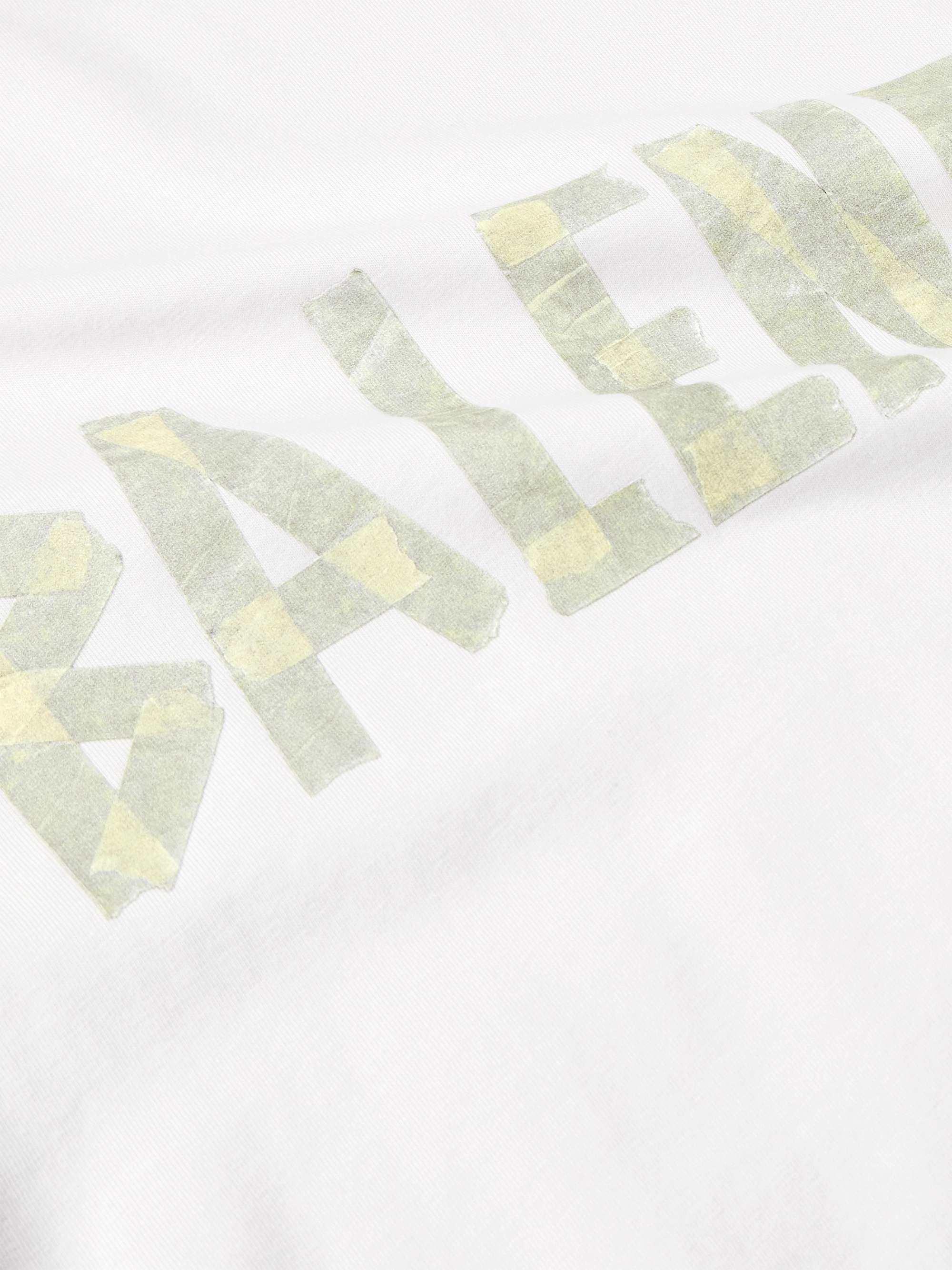 BALENCIAGA Oversized-T-Shirt aus Baumwoll-Jersey mit Logoprint in Distressed-Optik