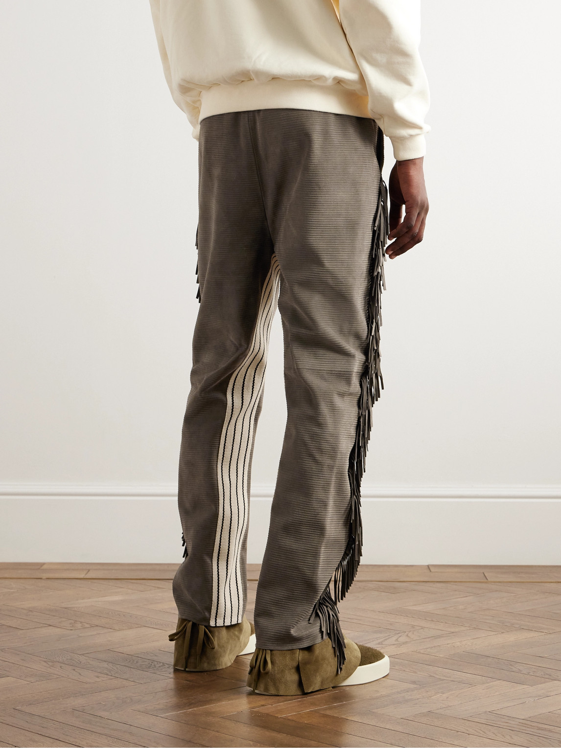 Shop Fear Of God Straight-leg Logo-appliquèd Ribbed Fringed Suede Trousers In Brown