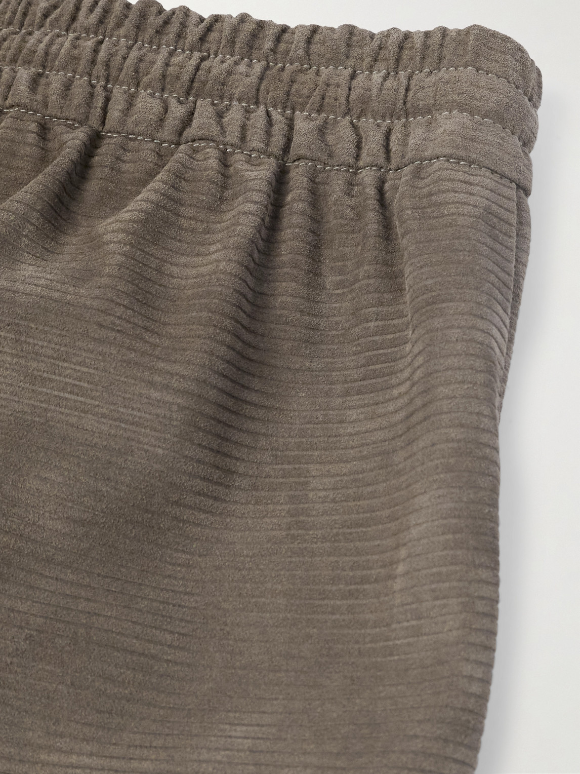 Shop Fear Of God Straight-leg Logo-appliquèd Ribbed Fringed Suede Trousers In Brown