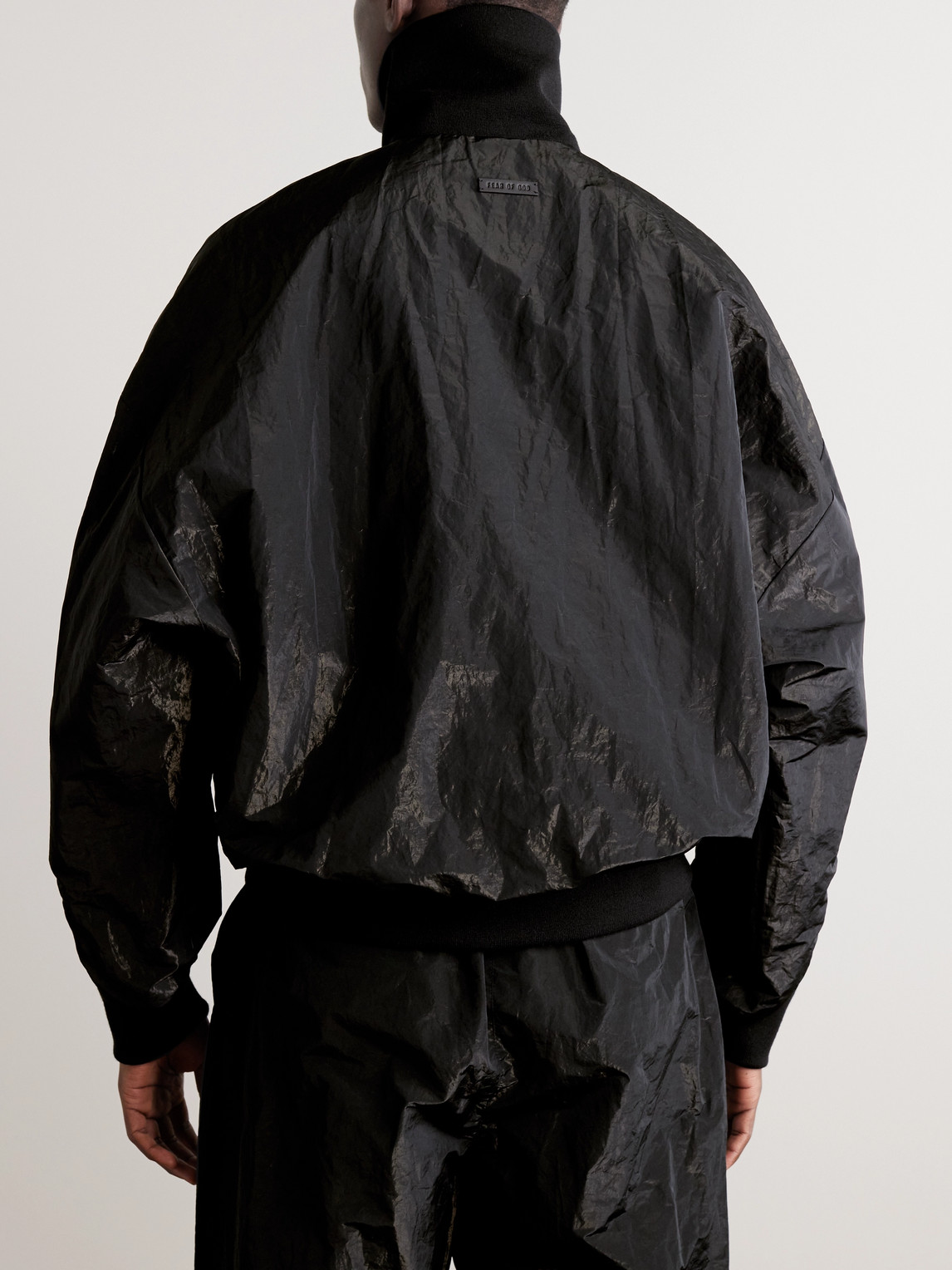 Shop Fear Of God Logo-appliquéd Crinkled-shell Half-zip Track Jacket In Black