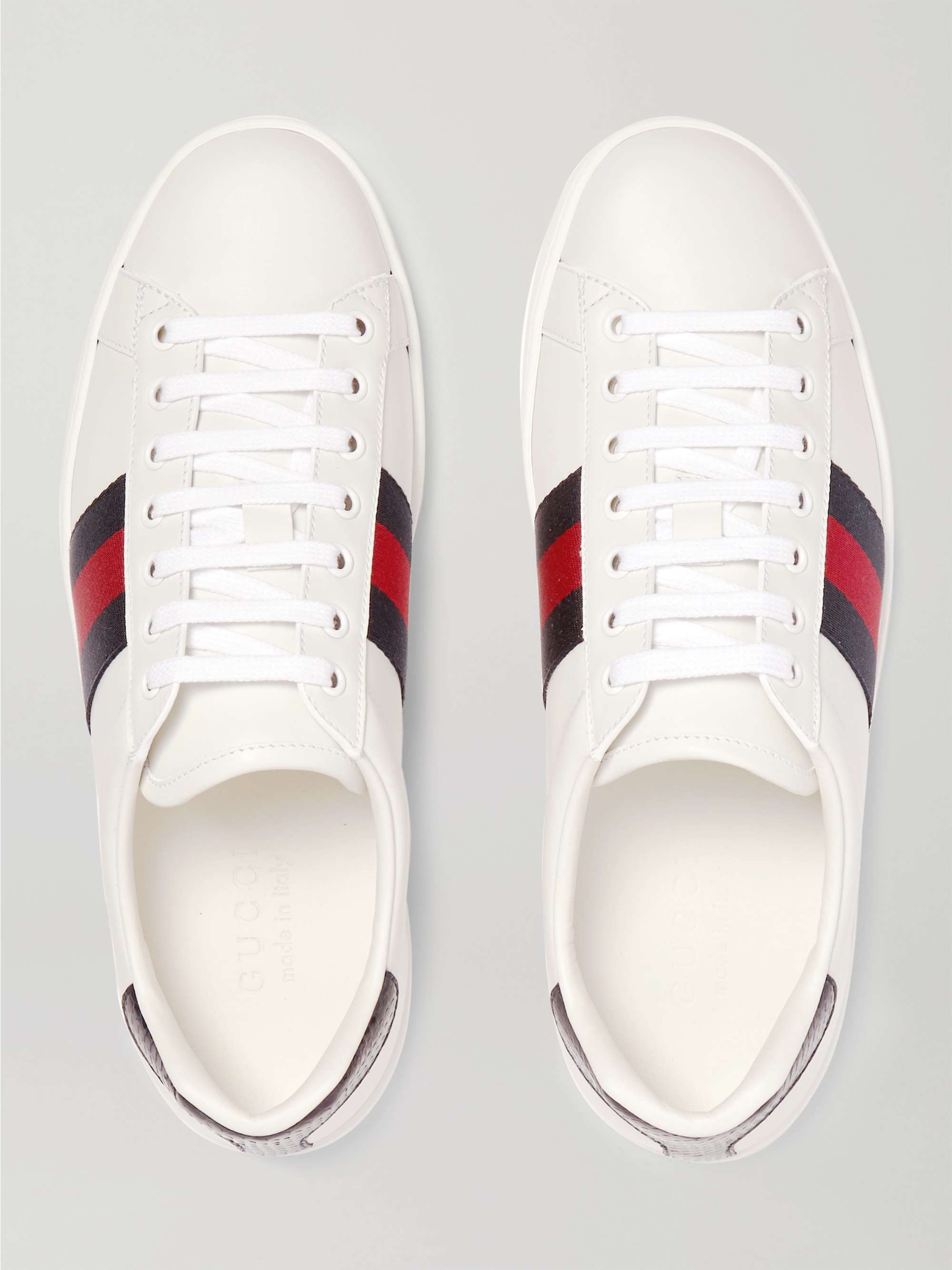أبيض حذاء سنيكرز Ace من الجلد بحاشية من جلد ثعبان الماء الصناعي | GUCCI |  MR PORTER