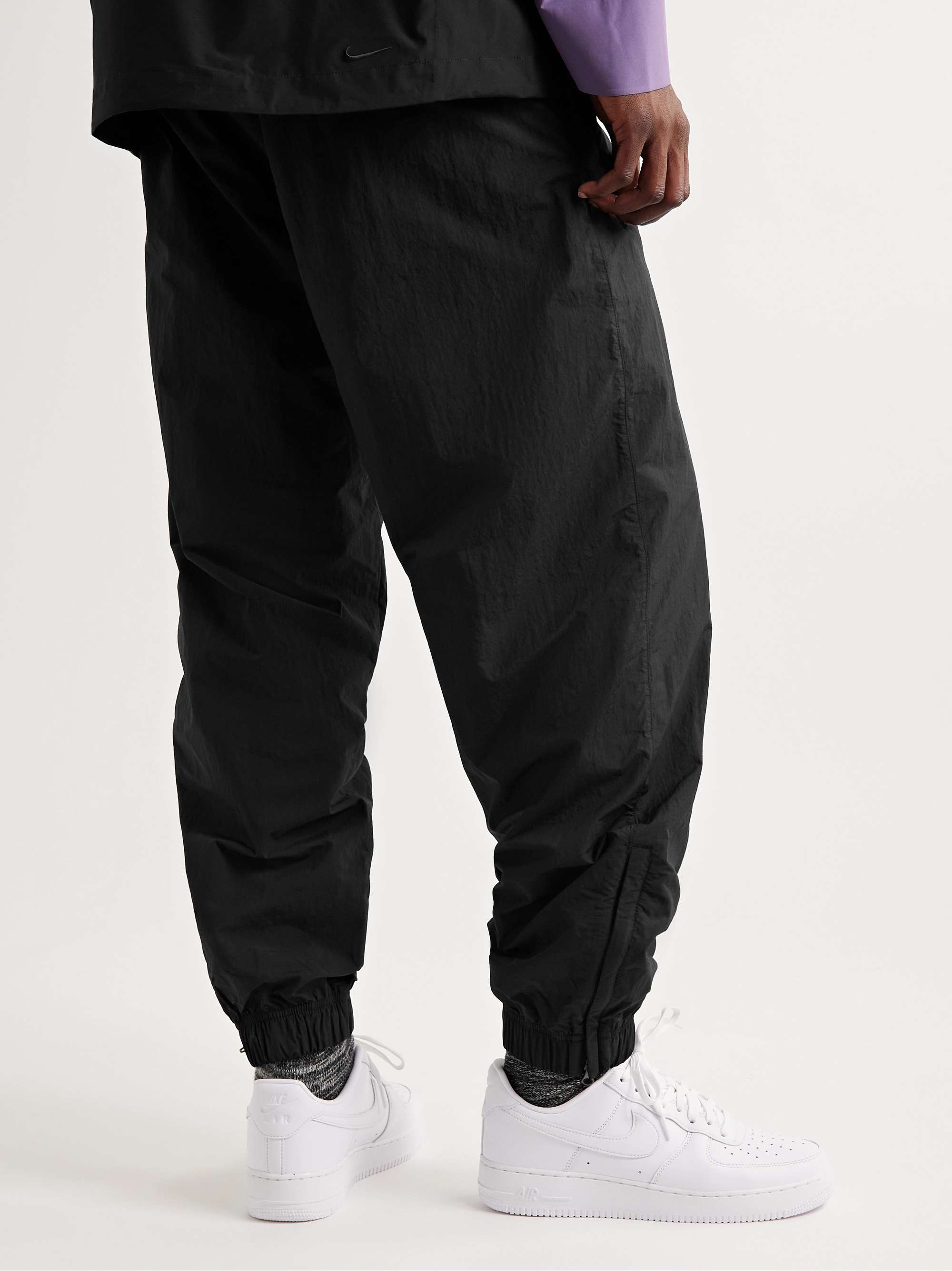 NIKE Solo Swish Tapered Logo-Embroidered Shell Track Pants | MR PORTER