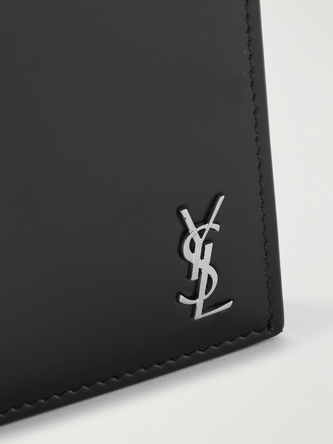 Shop Saint Laurent Logo-appliquéd Leather Billfold Wallet In Black